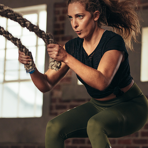 Woman pulling on rope