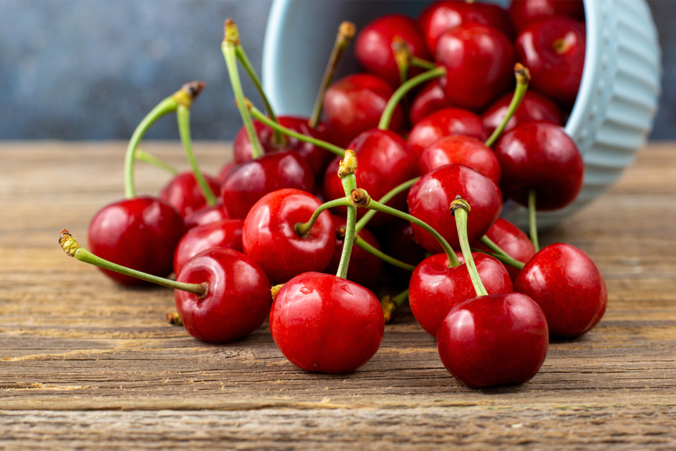 Bowl of cherries overflowing