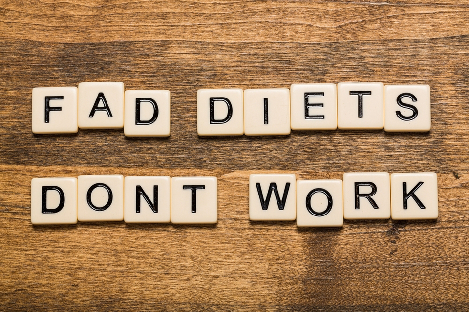 Scrabble pieces spelling out "Fad diets don't work"