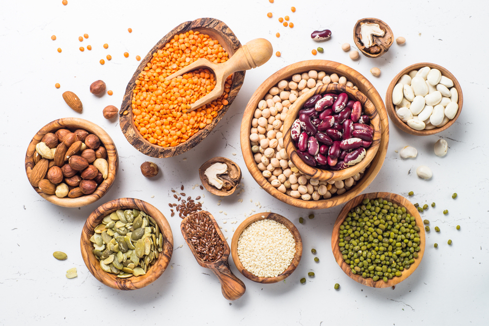 bowls of various nuts, seeds and grains