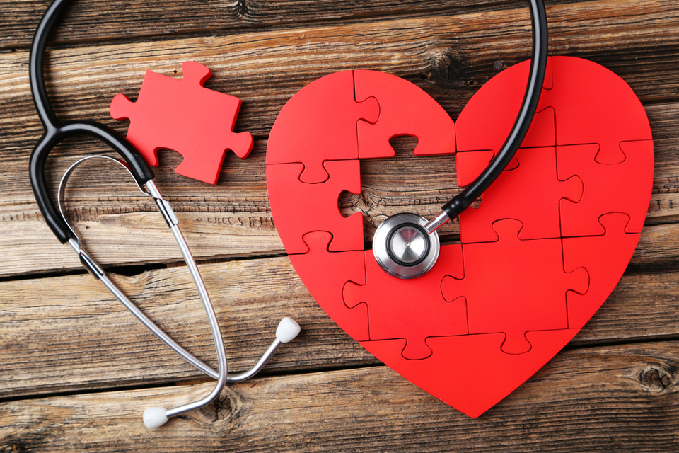 A heart shapped puzzle with a stethoscope