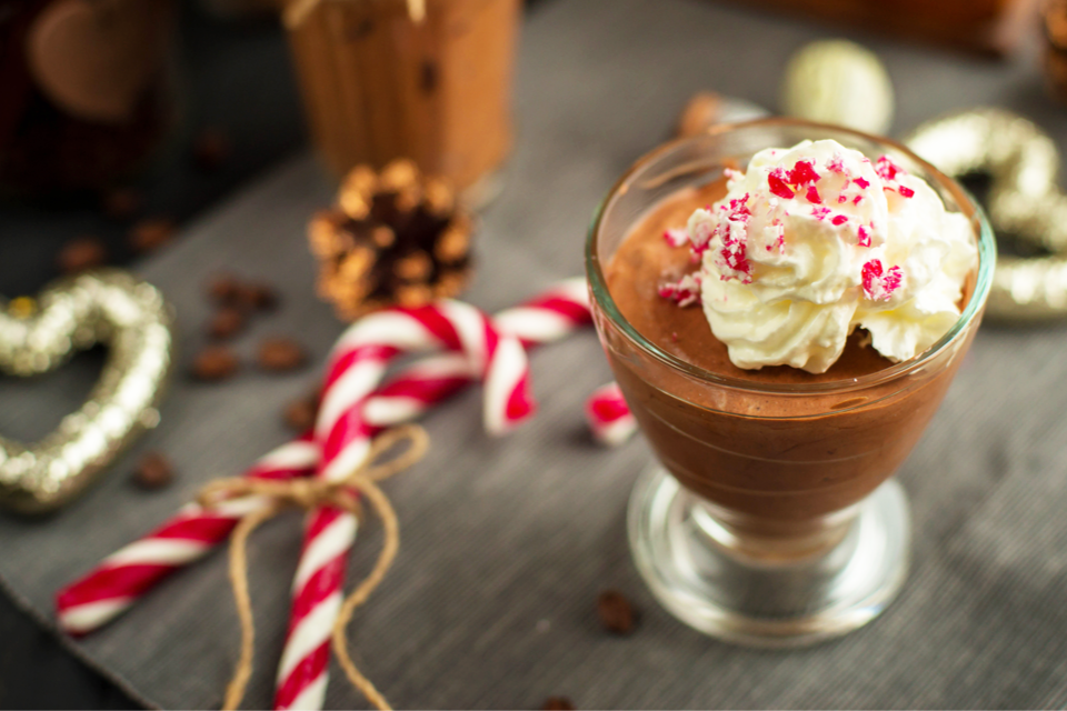 Guilt-Free Chocolate Peppermint Pudding with christmas decorations in the background
