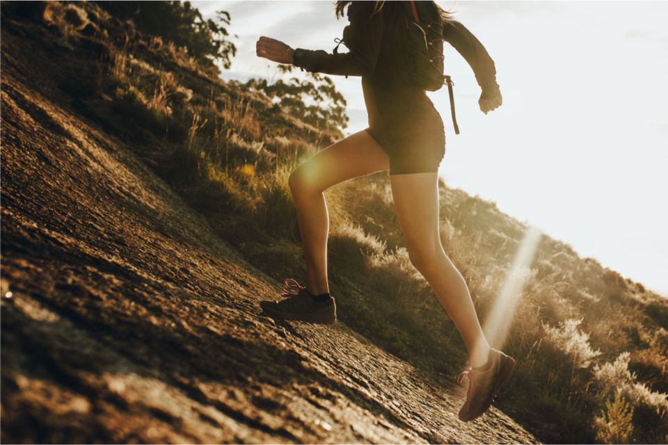 Woman running on a hike