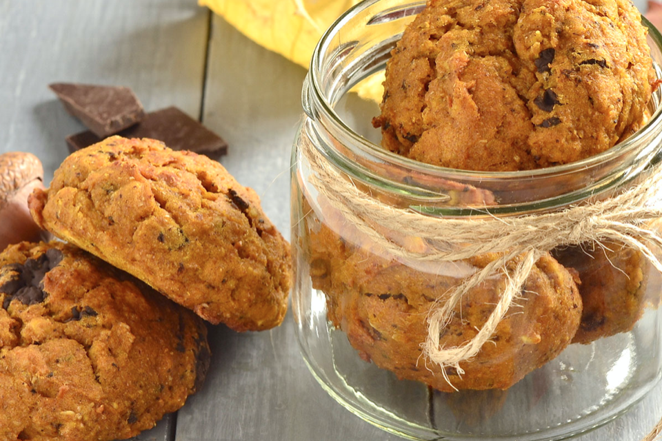 Pumpkin spice protein puffs in a jar and on a table