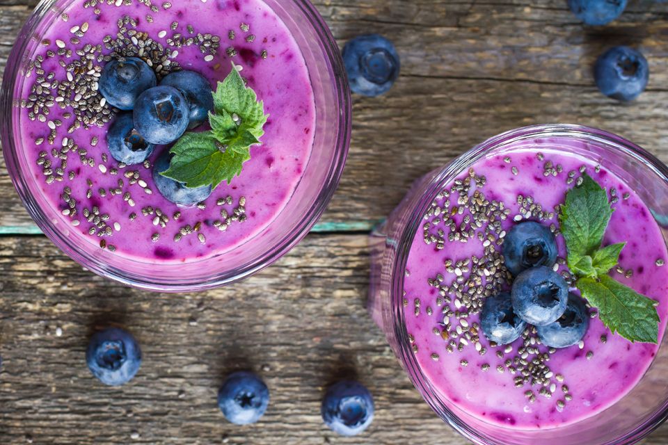 Two glasses of blueberry smoothies