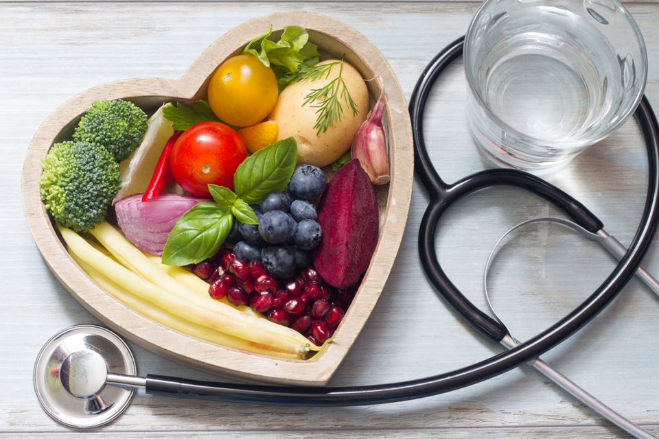 Heart shaped bowl with fruits and vegetables