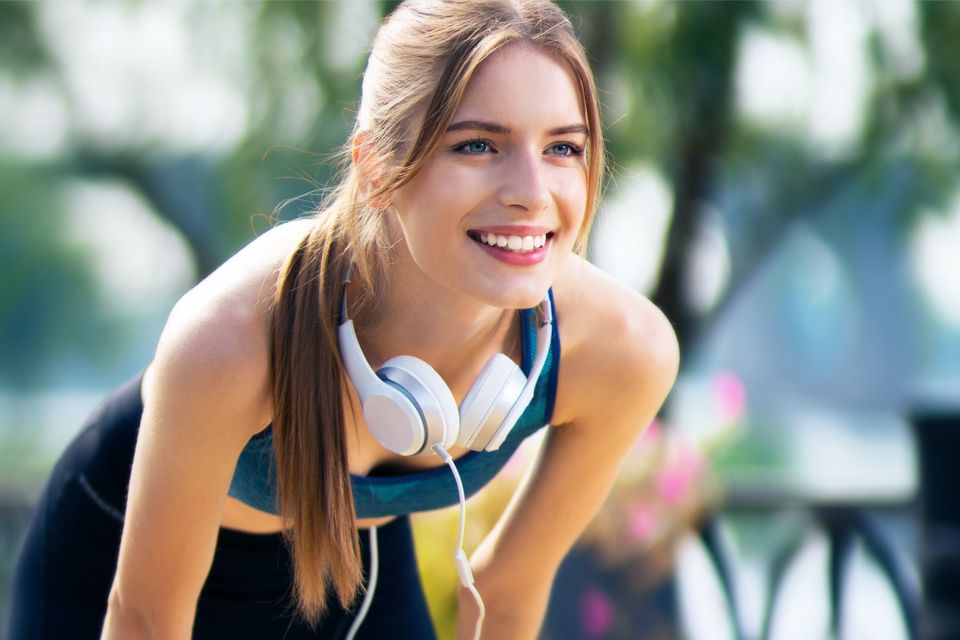 Woman smiling in workout attire